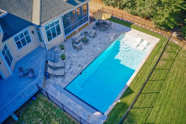 River Pools D40 Arctic White with Natural Stone patio and coping 12