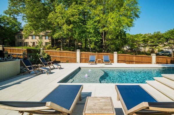 River Pools D40  SS08 in Granite Gray with cascades bubblers and natural stone patio and coping 15
